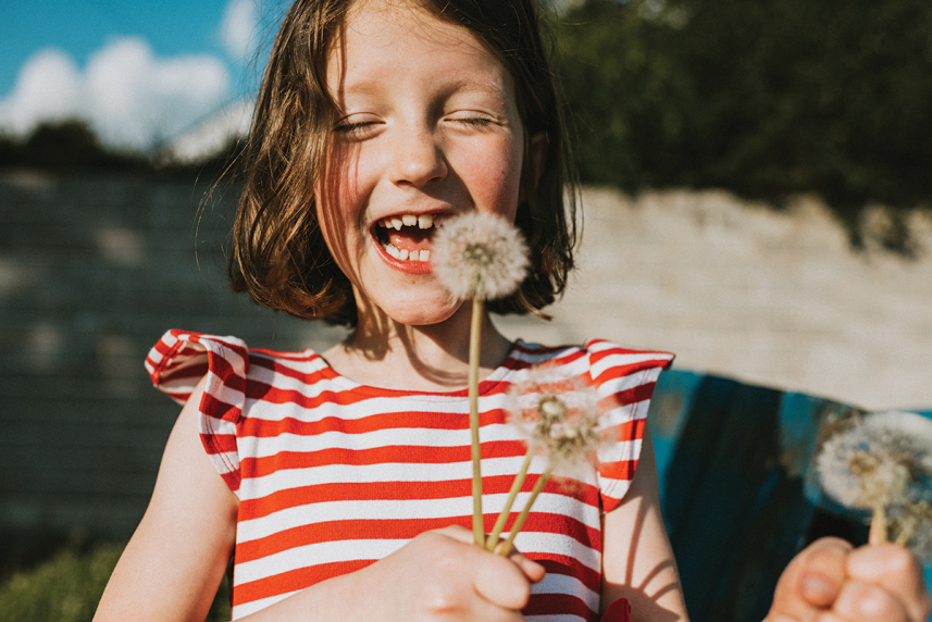 Child holding flowers
