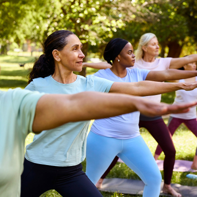 A group of women stretching outside