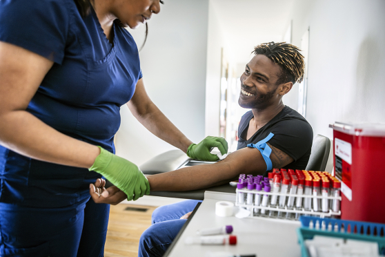 Man getting his blood drawn.