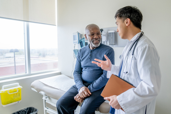 Man talking to doctor