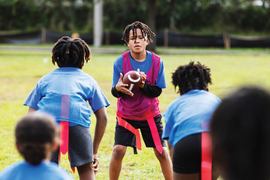 Kids playing flag football.