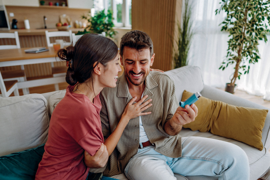Couple smiling and laughing together.